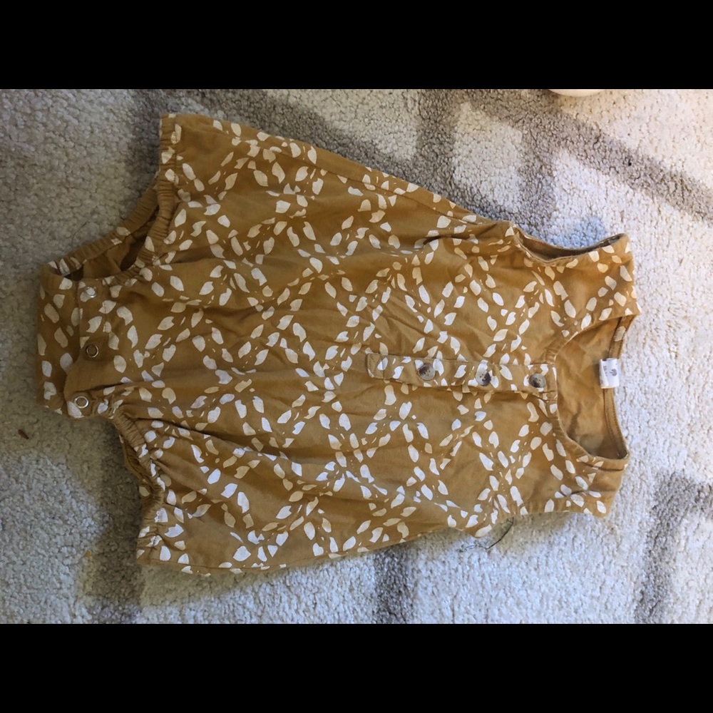 Mustard printed bubble body-suit. Kate Quinn